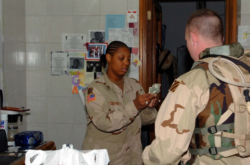 Sgt. Sherrie Cooper Counts Out Change