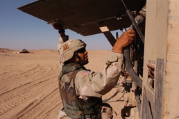 Sgt. Sherrie Cooper Works on a Tanker Pump