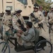Arm-cycle recipient thanks Sgt. Dominguez
