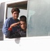 Poll Workers Ride in a Bus