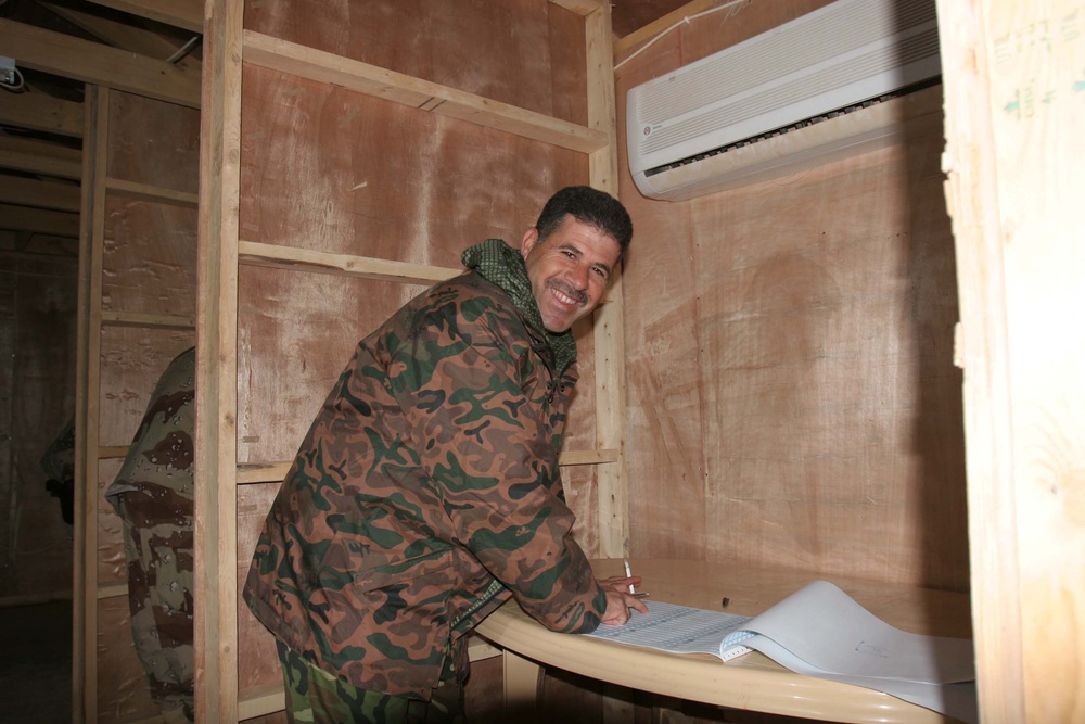 Colonel Rizak Saleem casts his vote