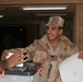 A Soldier drops a ballot in the ballot box