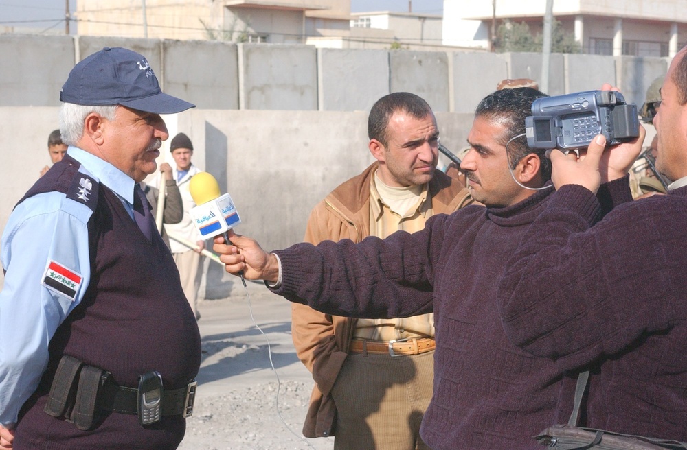 An Iraqi Police Commander is interviewed by the Iraqi Media Network