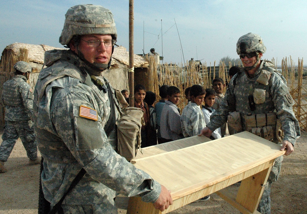 US Soldiers Deliver Desks and School Supplies to Local An Nasiriyah Children