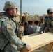 US Soldiers Deliver Desks and School Supplies to Local An Nasiriyah Children