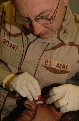 Army dentist helps Iraqis with prosthetics