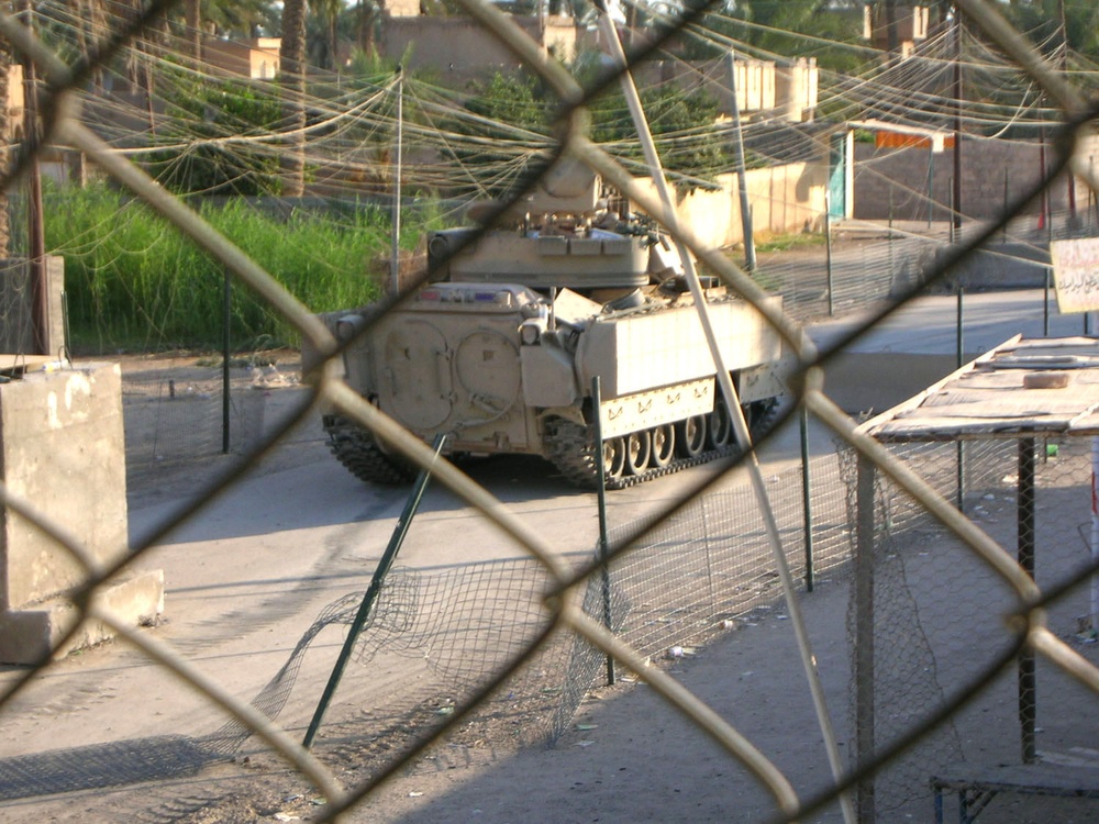 A Bradley Fighting Vehicle Guards a Street in Ramadi