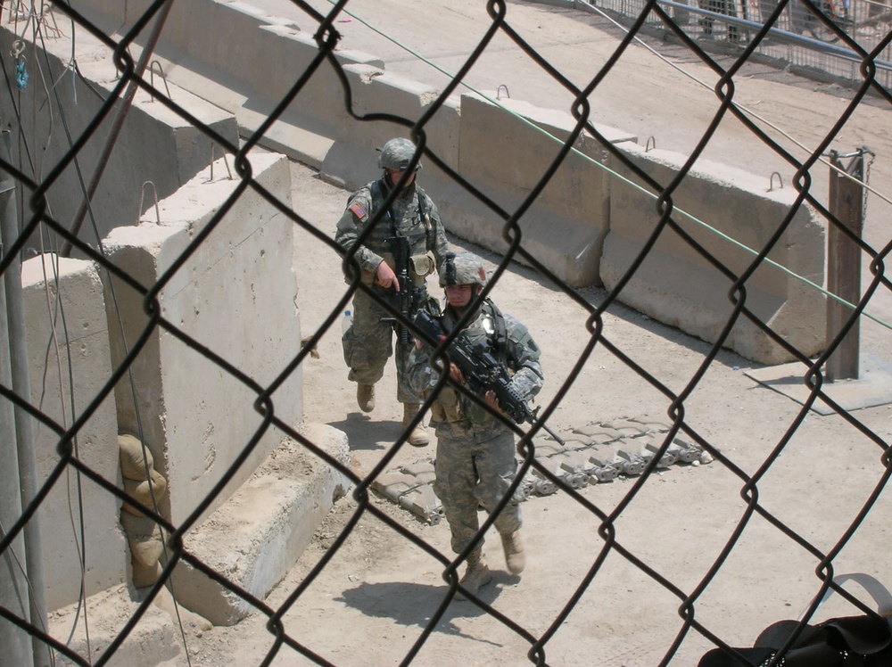 Two Soldiers Patrol Entry Control Point 5