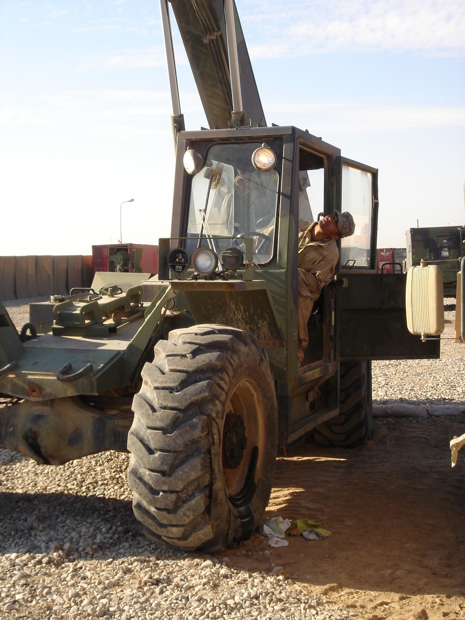 Pfc. Cedano operates a forklift