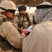 Soldiers help Iraqis file claims