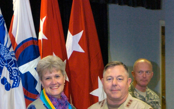 Cathy Speer receives the U.S. Central Command Commander's Outstanding Com