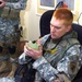 Cpl. Kupitz writes detailed notes during a meeting