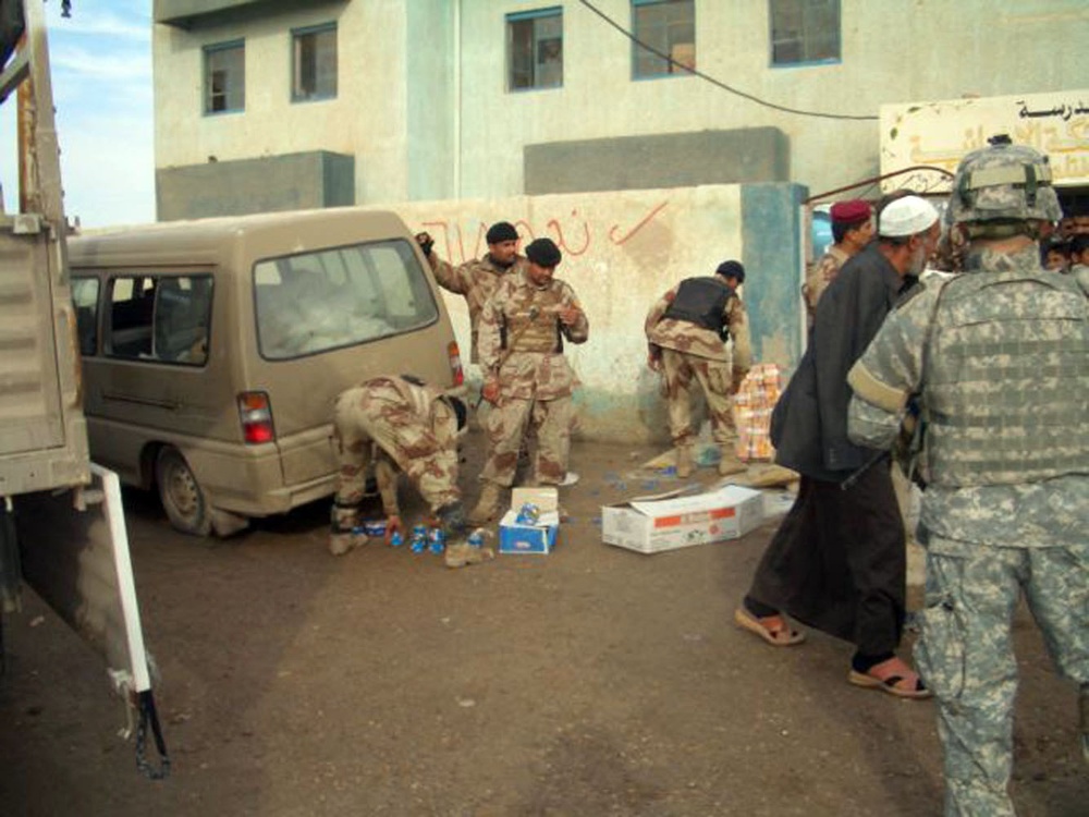 Soldiers provide humanitarian assistance to Abu Ghraib residents