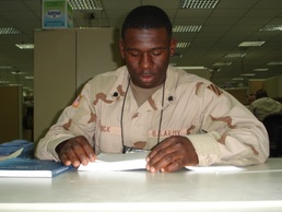 Deployed Soldier hits the books in Iraq