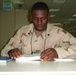 Deployed Soldier hits the books in Iraq