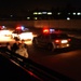 Iraqi Police vehicles line up for a night raid