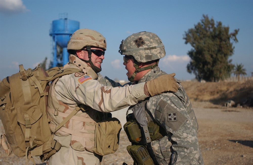 Father and son Soldiers meet