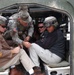 Delegates from Washington get a tour of a Stryker vehicle