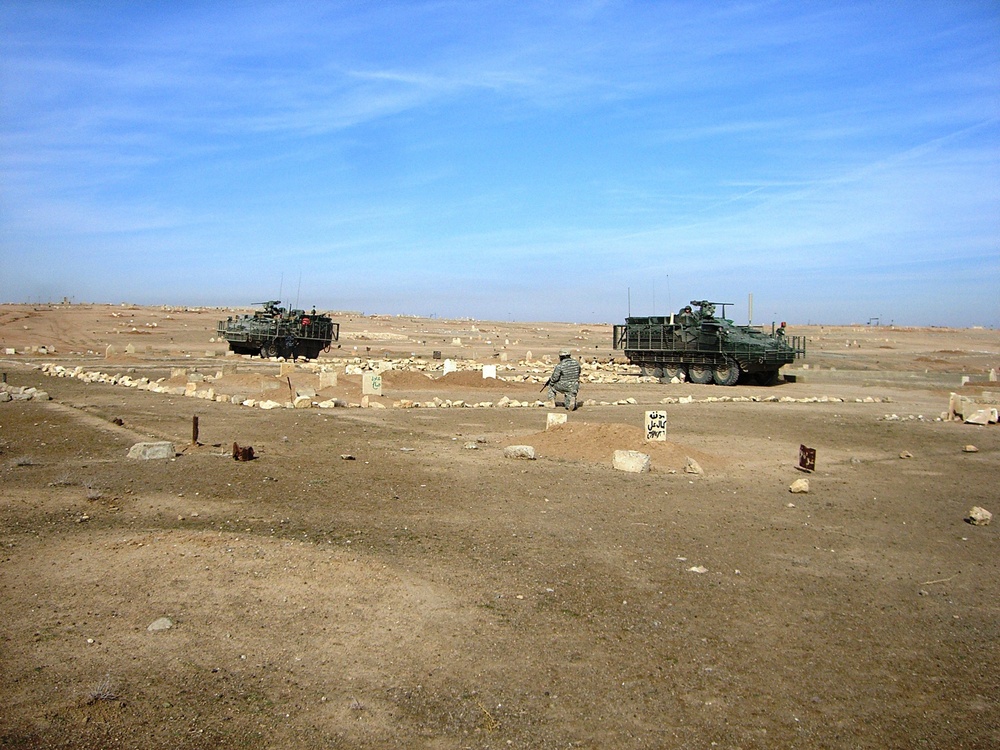 Soldiers pull security while on patrol