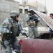 Soldiers conduct vehicle searches in Mosul