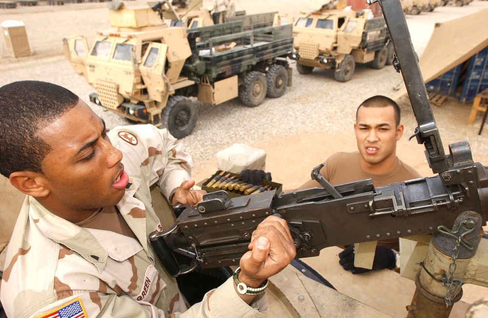 Spc. Green Cleans His .50 Caliber Machine Gun