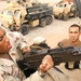 Spc. Green Cleans His .50 Caliber Machine Gun
