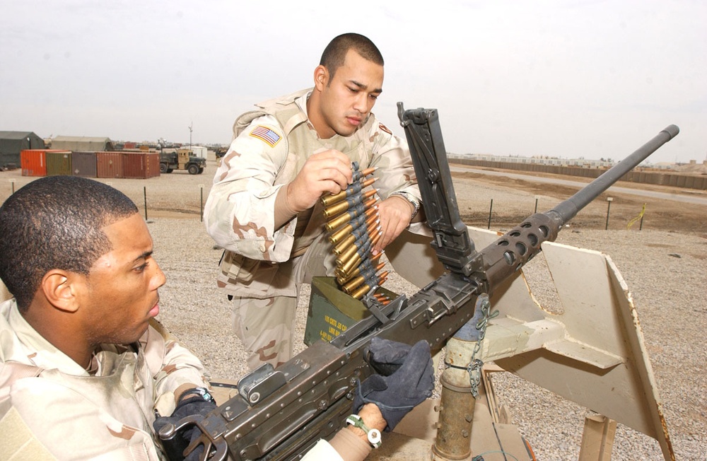 Spc. Green Cleans His .50 Caliber Machine Gun