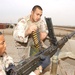 Spc. Green Cleans His .50 Caliber Machine Gun