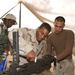 Spc. Green Cleans His .50 Caliber Machine Gun