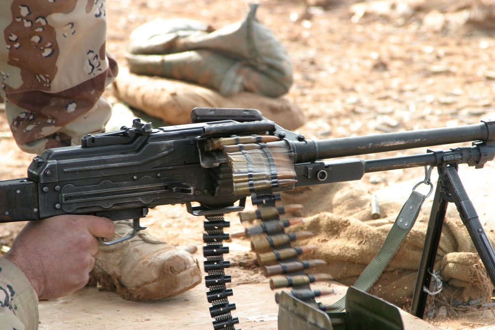 An Iraqi soldier tries his hand at firing the PKC