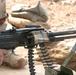 An Iraqi soldier tries his hand at firing the PKC