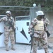 Iraqi Army Soldiers pull security during a cordon and search