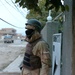 An Iraqi Army Soldier pull security during a cordon and search