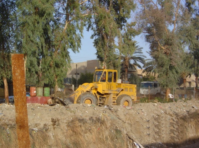 Front Loader Is Used to Clean Up Trash in Al-Rasheed