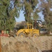Front Loader Is Used to Clean Up Trash in Al-Rasheed