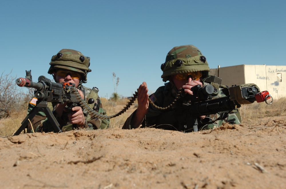 Pvt.s Caldwell and Ennis provide over-watch security