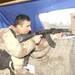 An Iraqi Soldier remains alert at his post