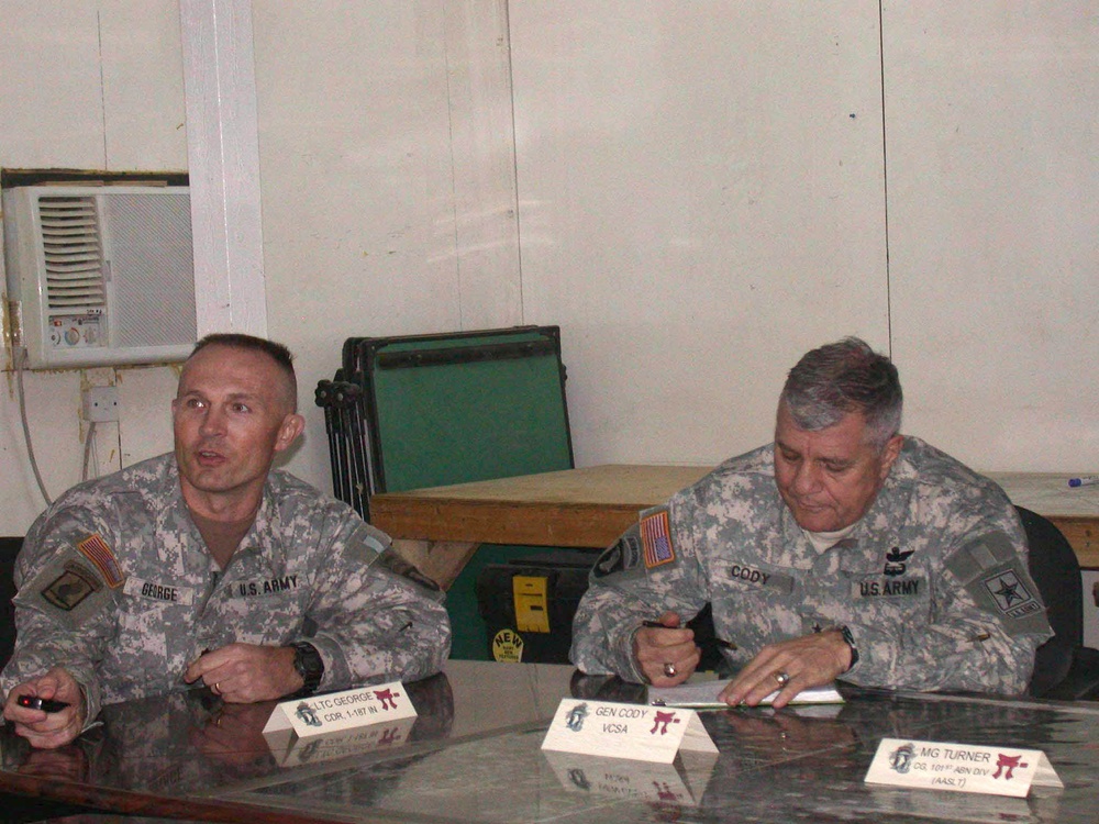 Lt. Col. George briefs Gen. Cody