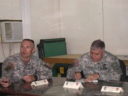Lt. Col. George briefs Gen. Cody