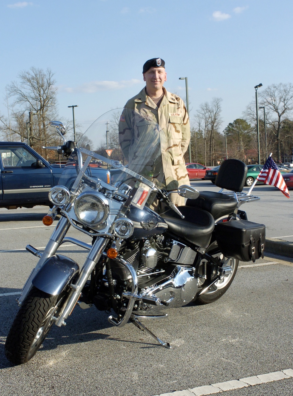 1st Sgt. Northen Stands With His Harley Davidson Fatboy