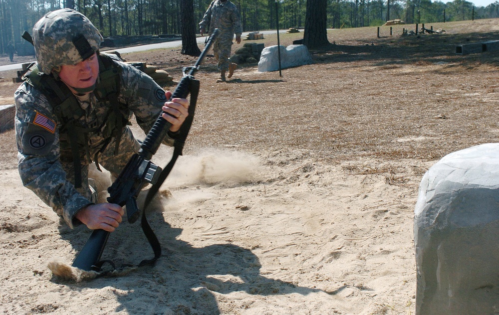 Capt. Kaufman Dives Into the Sand for a Firiing Position