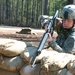 Capt Harper Checks Over a Sandbag Wall for Any Enemy Forces