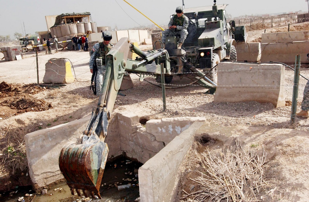 Soldiers clear canal