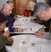 Soldiers sign up for the 5K run