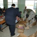 Soldiers hand out school supplies