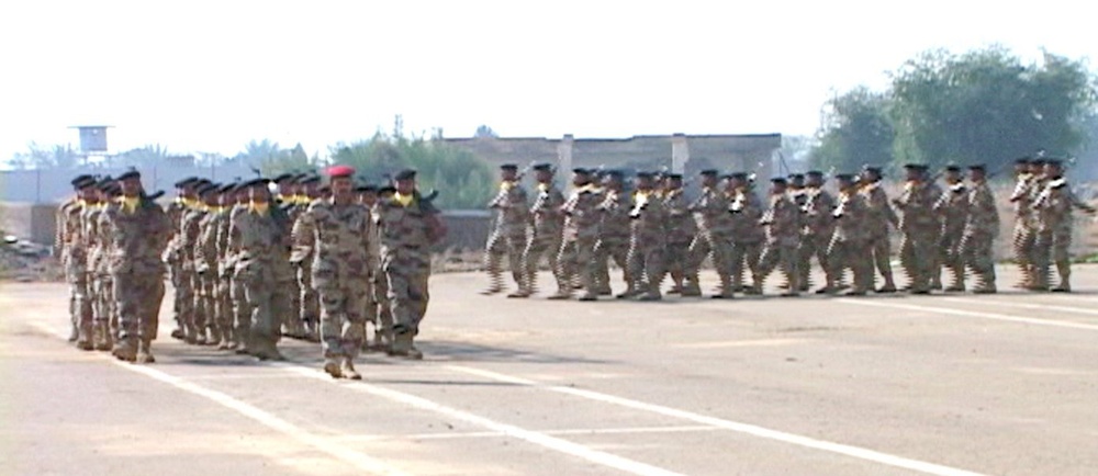 Iraqi Soldiers march in a parade formation
