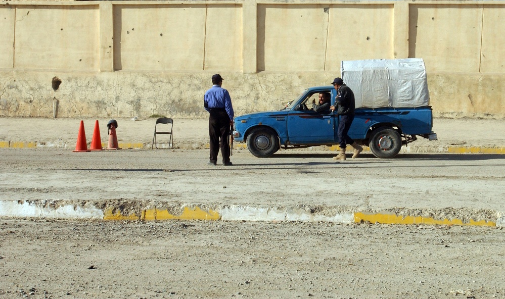 Police Officers Check Vehicles