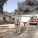 Iraqi, American Firefighters Battle Blaze at Weapons Training Si