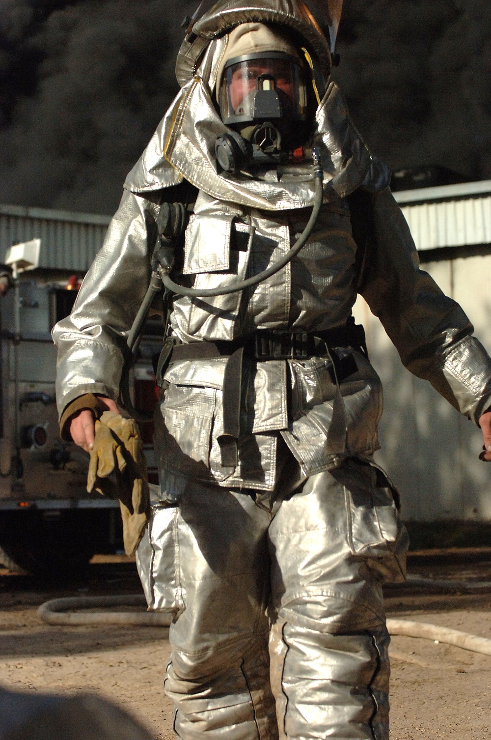 Iraqi, American firefighters battle blaze at weapons training si