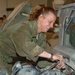 Staff Sgt. Birkman repairs an engine on a humvee